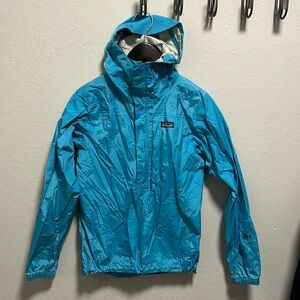 Blue Patagonia rain jacket